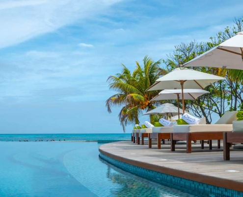 denis-private-island-pool-with-chairs denis-private-island-pool-with-chairs