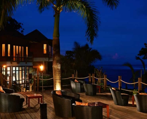 doubletree-hilton-seychelles-wooden-deck-seating-area doubletree-hilton-seychelles-wooden-deck-seating-area
