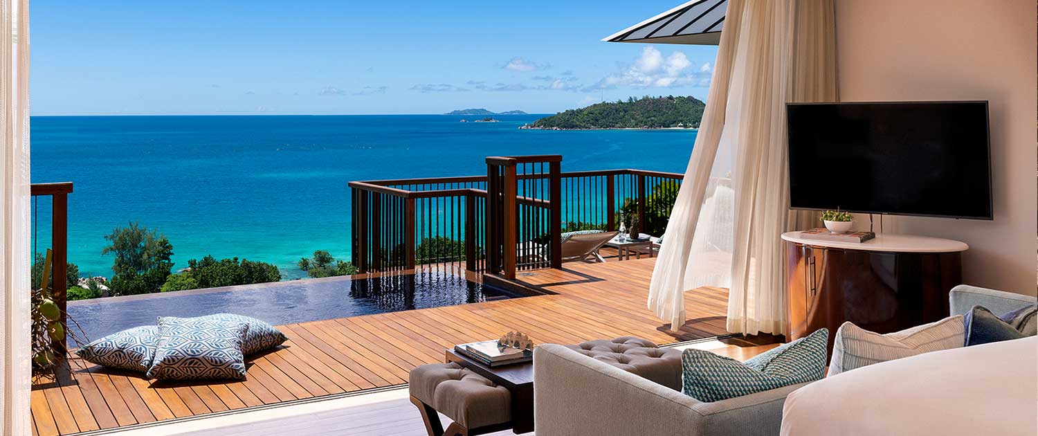 Raffles Seychelles hero image view over ocean Raffles Seychelles hero image view over ocean