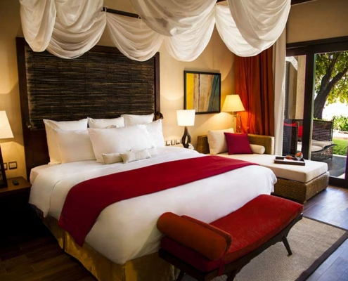 story-restort-seychelles-garden-suite-bedroom-living-area story-restort-seychelles-garden-suite-bedroom-living-area