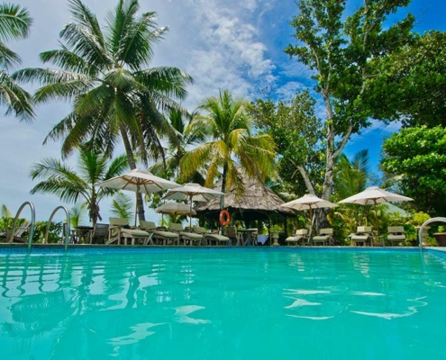 Indian-Ocean-Lodge-pool-with-chairs Indian-Ocean-Lodge-pool-with-chairs