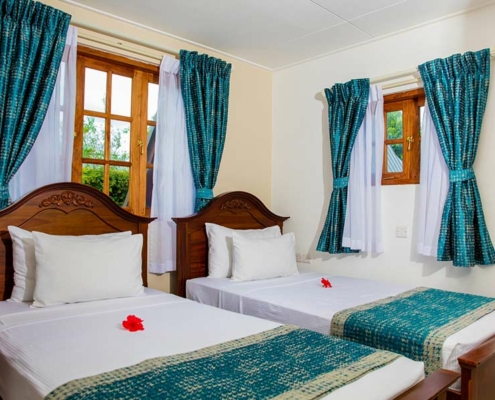 La-Digue-Island-Lodge-beach-house-bedroom La-Digue-Island-Lodge-beach-house-bedroom