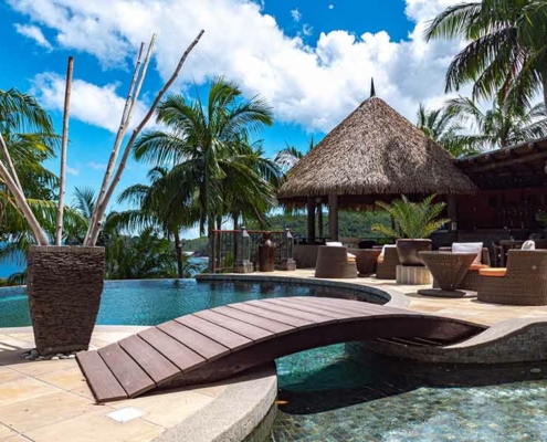 valmer-resort-mahe-pool-with-bridge valmer-resort-mahe-pool-with-bridge